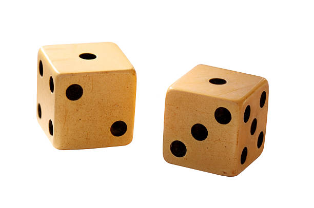 Two wood dice isolated on white.  Clipping path.  Copy space. stock photo