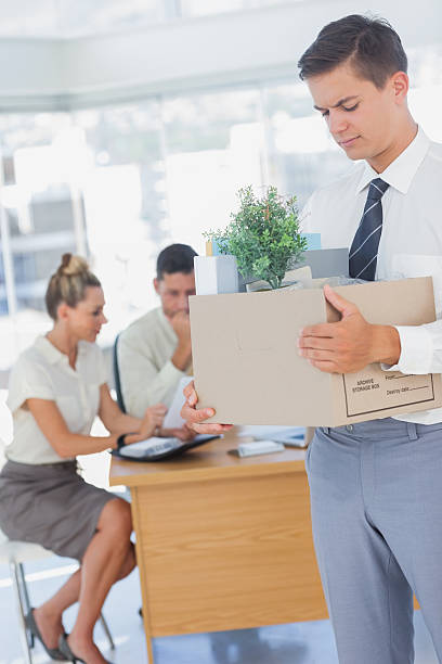 istock Businessman leaving office after being let go 459208695