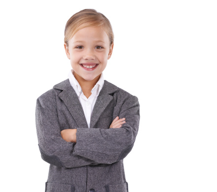 Cropped image of a young girl pretending she is a businesswoman with her arms crossed