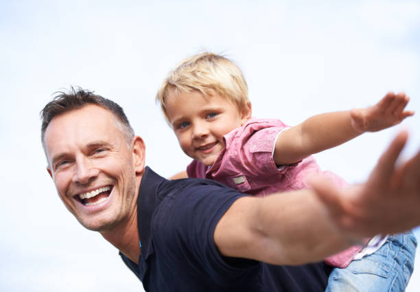 istock Giving his son wings! 459211145
