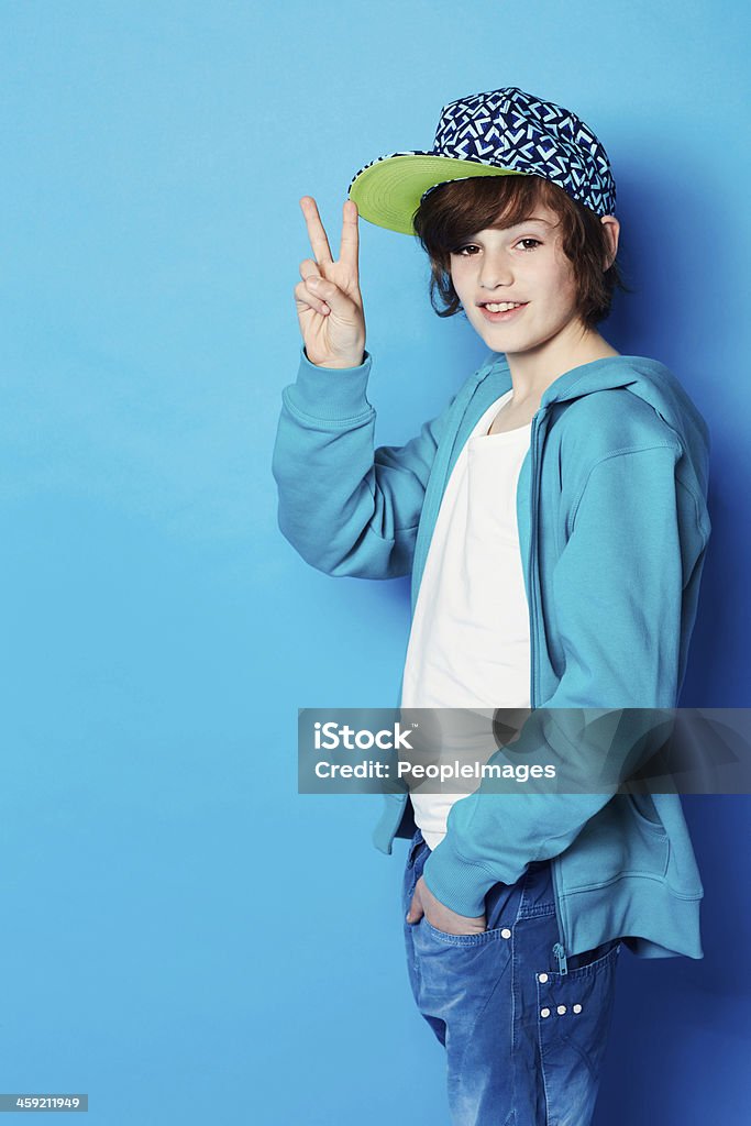 Peace homie Portrait of a young boy gesturing "peace" Boys Stock Photo