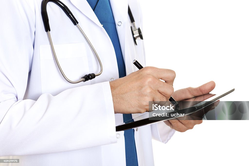 Médico escrever tela de tablet - Foto de stock de Acidentes e desastres royalty-free