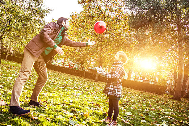 istock Father and daughter playing together 459222383