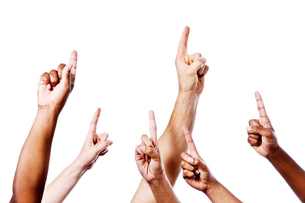 istock Onward and upward! Many hands pointing up on white 459222599