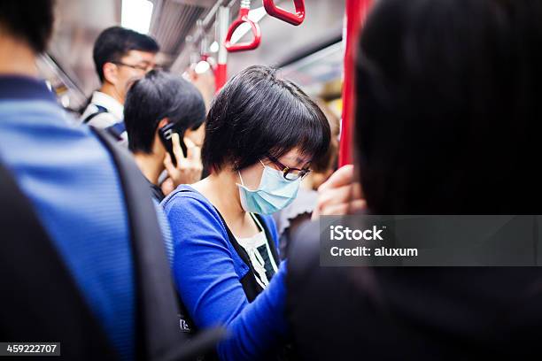 Woman With Mask In Subway Train Stock Photo - Download Image Now - Adult, Asia, China - East Asia