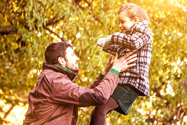 istock Father and daughter playing together 459222741