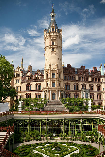 Schwerin Castle Schwerin, Germany - July 9th, 2011. Front view on the garden and the entrance of Schwerin castle in northern Germany (Mecklenburg-Vorpommern region). schwerin castle stock pictures, royalty-free photos & images