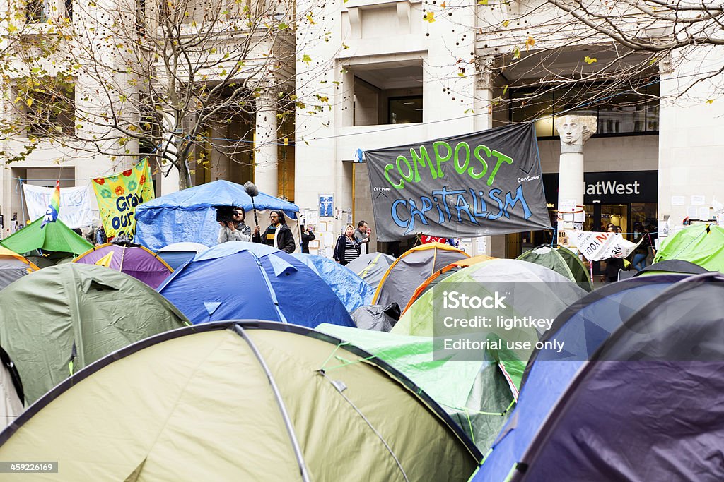 Occupy London Stock Exchange London, United Kingdom - December 1, 2011: Tents representing the movement " Occupy London Stock Exchange " protesting against the governament and the financial system outside St Paul's Cathedral, London, UK. Movement born from " Occupy Wall Street" in New york. Camping Stock Photo