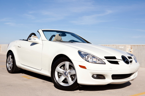 Scottsdale, United States - November 3, 2011: A photo of a parked white 2008 Mercedes Benz SLK280 cpue, the SLK line from Mercedes is their most compact coupe.