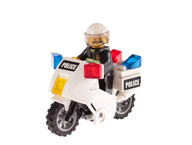 lego-mann-polizei - lego construction toy isolated on white isoalted stock-fotos und bilder
