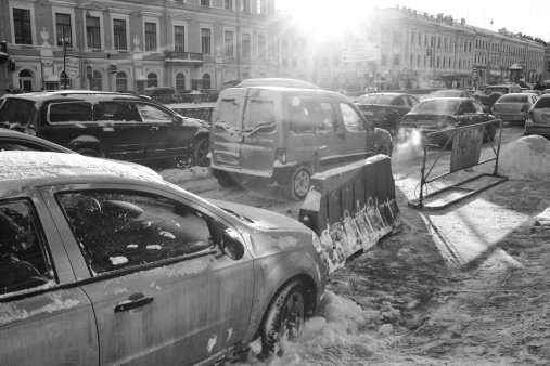 St Petersburg, Russian Federation - January 26, 2011 : Busy early evening traffic on a snow covered Nevsky Prospect in st Petersburg. Nevsky Prospect is the main shopping avenue in St Petersburg and lined with grand architecture..
