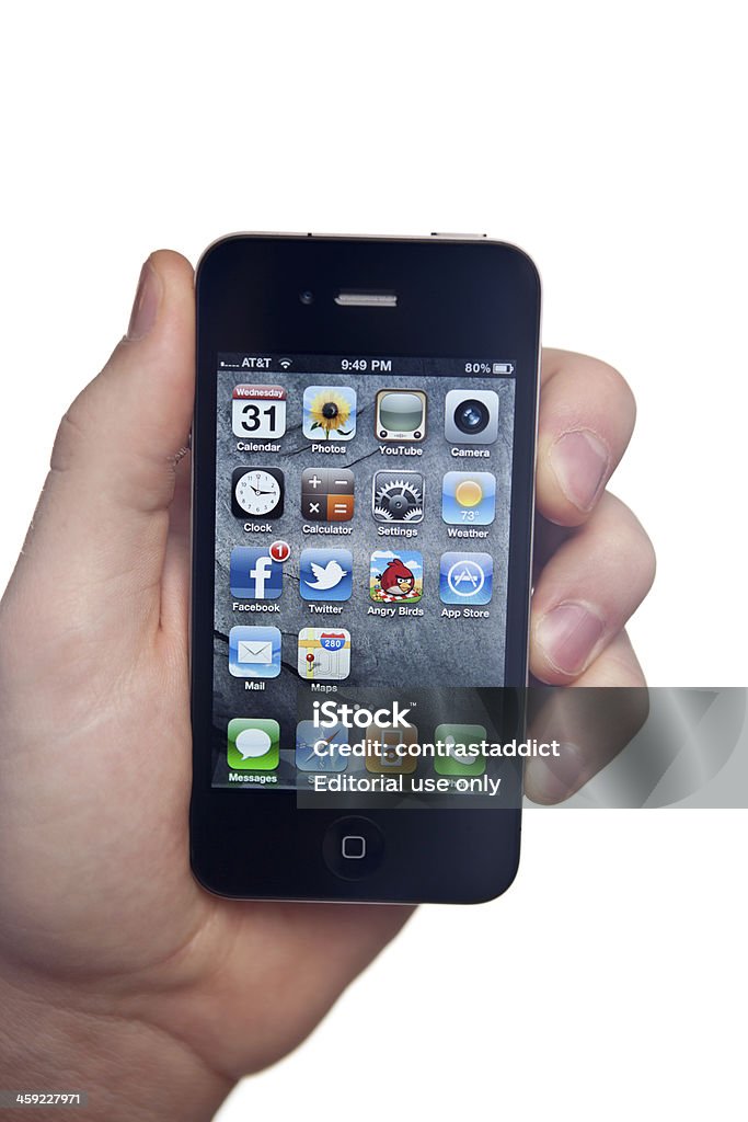 Mão segurando o Apple iPhone 4. - Foto de stock de Angry Birds - Jogo royalty-free