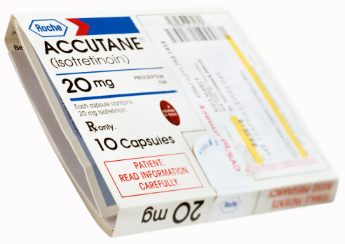 Truro, MA, USA - October 13, 2011 : Package of Accutane acne treatment. Accutane is manufactured by F. Hoffmann-La Roche Ltd. with headquarters in Basel, Switzerland.