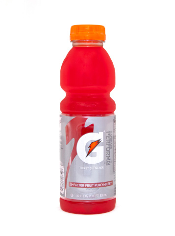 Nashville, USA - July 21st, 2011: A tall and skinny new Gatorade bottle design, filled with X-factor fruit punch flavored sports drink, isolated on a white background.