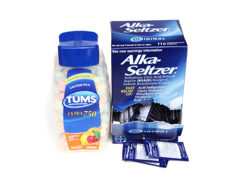 West Palm Beach, USA - October 8, 2011: This is a studio shot of two brands of indigestion and heartburn relief: Tums and Alka-Seltzer. Tums is a product of GlaxoSmithKline. Alka-Seltzer is made by Bayer.