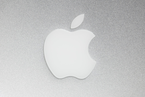 Merano, Italy - August 24, 2011: the Apple Macintosh logo on the back of a Macbook Pro