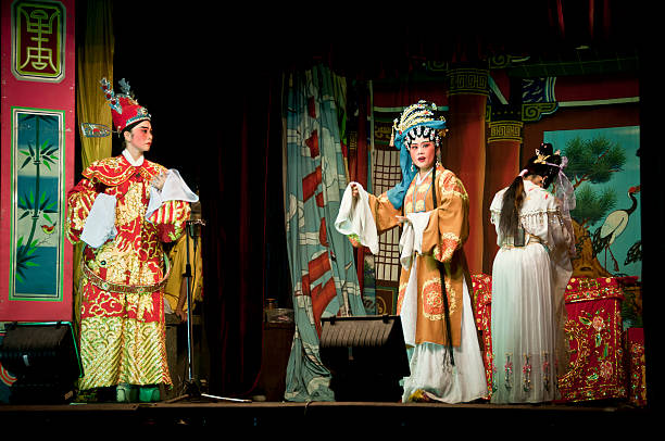 Chinese Opera during Hungry Ghost month Butterworth, Malaysia - August 4, 2011: Artists perform a Chinese opera during the Hungry Ghost festival in Malaysia's northern town of Butterworth. chinese opera makeup stock pictures, royalty-free photos & images