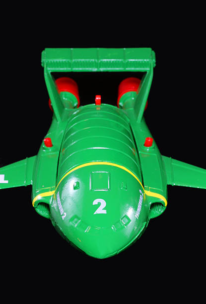 Vancouver, Canada - January 29, 2012: Thunderbird 2, from the Thunderbirds television series, against a black background. The toy is from Matchbox.