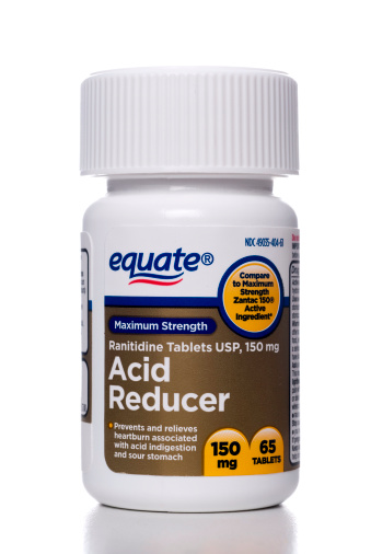Miami, USA - February 05, 2012: Equate Acid Reducer Ranitidine 150 mg Tablets. Equate is part of Walmart\'s private label store brands for consumable pharmacy and health items.
