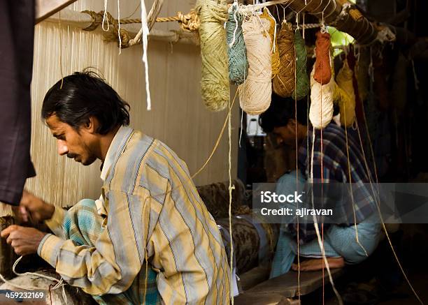 Carpet Weavers Working In The Shop Stock Photo - Download Image Now - Labor Intensive Production Line, Adult, Blue