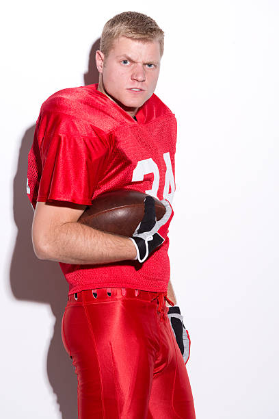 istock American football player with ball 459233611