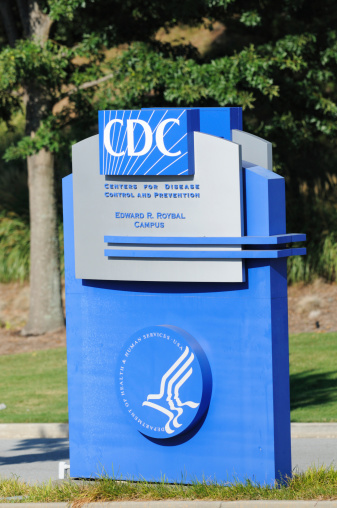 Atlanta, Georgia, USA - August 28, 2011:  Entrance sign for Centers for Disease Control and Prevention.  Sign located near the 1700 block of Clifton Road in Atlanta, Georgia, on the Emory University campus. Vertical composition.