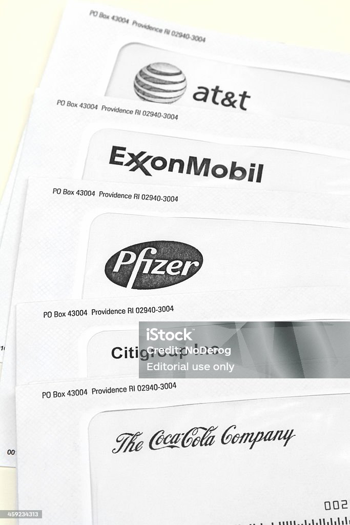 Blue chip investment statements West Palm Beach, USA - September 7, 2011: This is a studio shot of Blue Chip investment statements showing the corner portion of white envelopes with the trademark logos of the companies. The companies represented are Coca Cola, Citigroup, Pfizer, ExxonMobil and ATT. AT&T Stock Photo