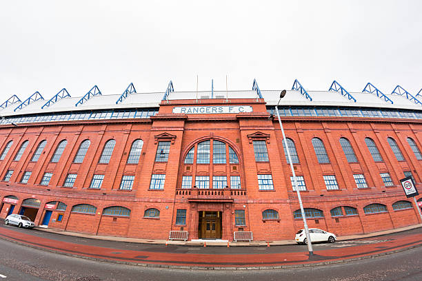 Ibrox Stadium, Glasgow Glasgow, UK - October 20, 2013: The Bill Struth Main Stand and main entrance at Ibrox Stadium, Glasgow, the home ground of Glasgow Rangers Football Club. The main stand was built in 1928 with an impressive red brick facade. ibrox stock pictures, royalty-free photos & images