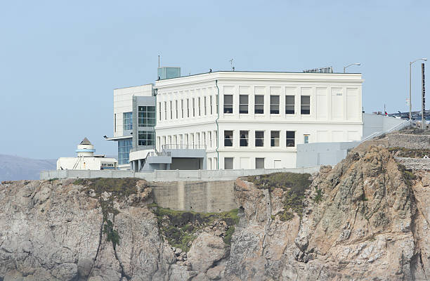 Cliff House in San Francisco, California San Francisco, United States - October 7, 2011: People walk around Cliff House overlooking the Pacific at Ocean Beach. A giant camera observation area can be seen on the left. cliff dwelling stock pictures, royalty-free photos & images