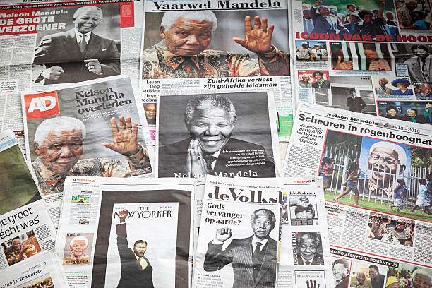 Nelson Mandela # 2 XXXL Amsterdam, the Netherlands - December 9, 2013: A number of Dutch newspapers with the news about the death of Nelson Mandela. South Africa's first black president and anti-apartheid icon Nelson Mandela has died at the age of 95 on Thursday at the age of 95. Mandela was in prison at Robben Island for nearly three decades for his fight against white minority rule. In 1993, Mandela was awarded the Nobel Peace Prize, an honor he shared with F.W. de Klerk, the white Afrikaner leader. Earlier this year, Mandela spent nearly three months in hospital with a recurring lung infection. newspaper titles stock pictures, royalty-free photos & images