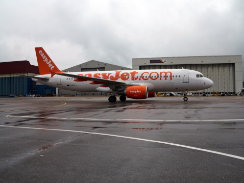 Stansted, England - September 13, 2013: Easyjet plane taxiiing on the tarmac at Stansted  Airport,