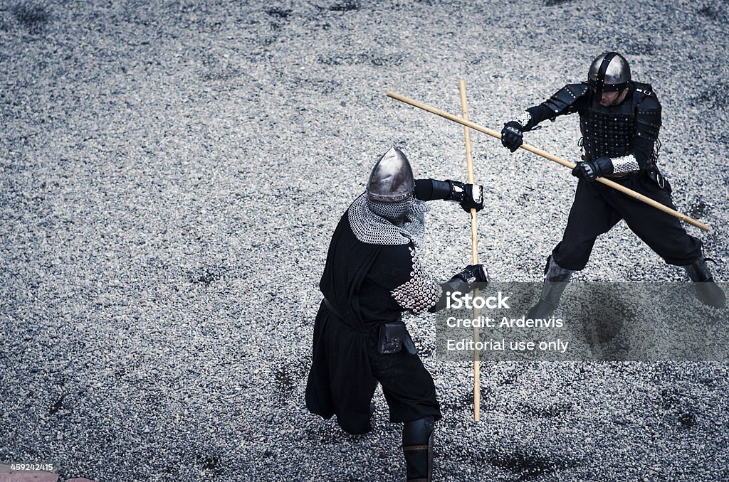 Due cavalieri che combattono in italian festival medievale castello Soncino - Foto stock royalty-free di Acciaio