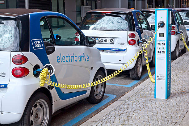 Berlin,Germany - September 08, 2013:Smart electric cars connected to the chargers on the street in the center of Berlin