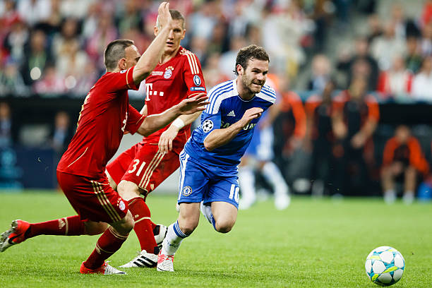 UEFA Champions League Munich, Germany - May 19, 2012: Juan Mata of Chelsea (r), Bastian Schweinsteiger (m) and Franck Ribey (l) of Bayern during FC Bayern Munich vs. Chelsea FC UEFA Champions League Final game at Allianz Arena on May 19, 2012 in Munich, Germany. match sport stock pictures, royalty-free photos & images