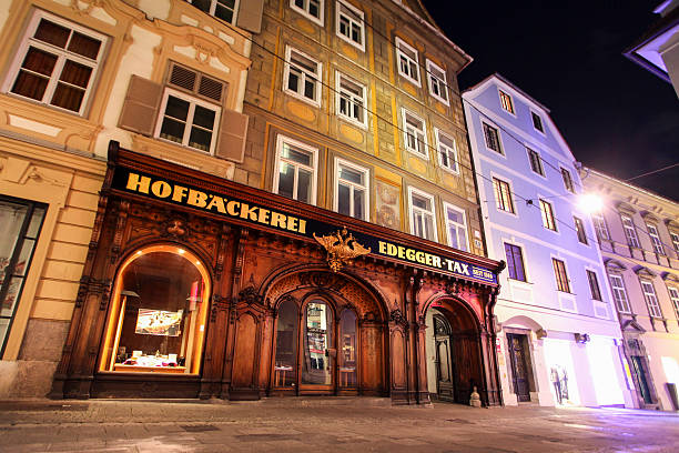 Graz, Austria - September 17, 2013: Hofbackerei Edegger-Tax is the oldest existing bakery in Graz and one of the oldest in Austria and Central Europe. It was first mentioned in 1569, but the history of the building dates back well into the 14th century. In 18th Century, Matthias Tax took over the bakery and made it one of the leading bakeries in Graz. Today it's one of local landmarks and a popular tourist spot in Graz.