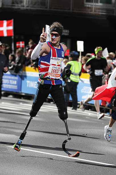 New York City Marathon New York City, USA - November 07, 2010: Paralympics hero Richard Whitehead running during the 2010 ING New York City Marathon. new york marathon photos stock pictures, royalty-free photos & images