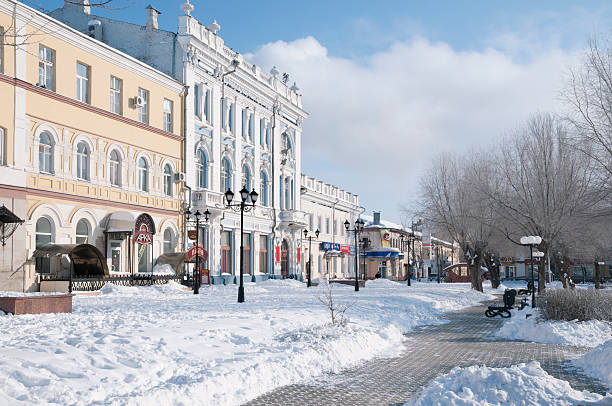 Winter. Akhmatovskaya street after a snowfall. Astrakhan, Russia. stock photo