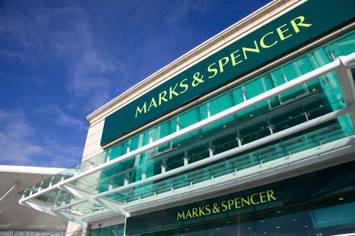 Bournemouth, England - October 15th 2012: Marks and Spencer Superstore on a bright sunny autumn morning before the crowds arrive at Castlepoint shopping centre, Bournemouth. Marks and Spencer is also known as M&S or Marks and Sparks and specialises in selling clothing and luxury foods.