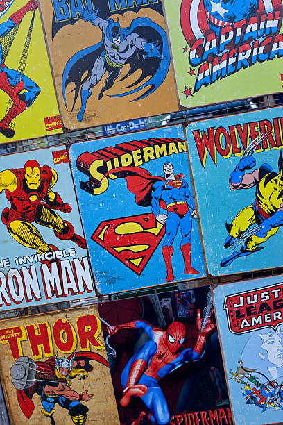 Spiderman "New York City, USA - December 6, 2012: Many different Spidermans in a stand for vintage accessories in Central Park." superman named work stock pictures, royalty-free photos & images