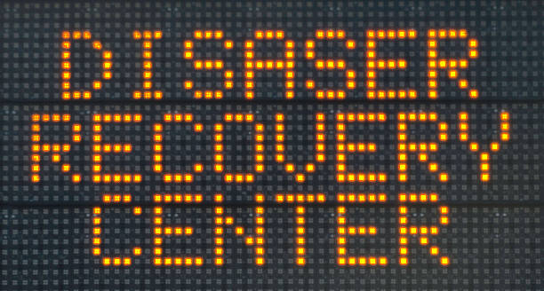 Disaster Recovery Center Sign "Beach Haven, New Jersey, USA - December 1, 2012: A large, temporary, illuminated, flashing, FEMA (Federal Emergency Management Assistance) sign in Beach Haven, Long Beach Island, New Jersey, directing victims of Hurricane Sandy to a local Disaster Relief Center." misspelled stock pictures, royalty-free photos & images