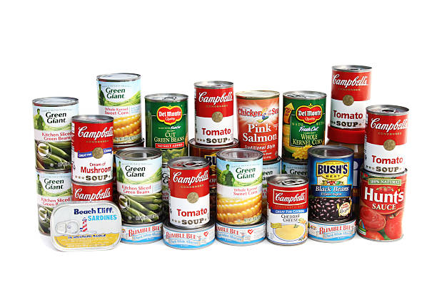 Large assortment of canned foods stock photo
