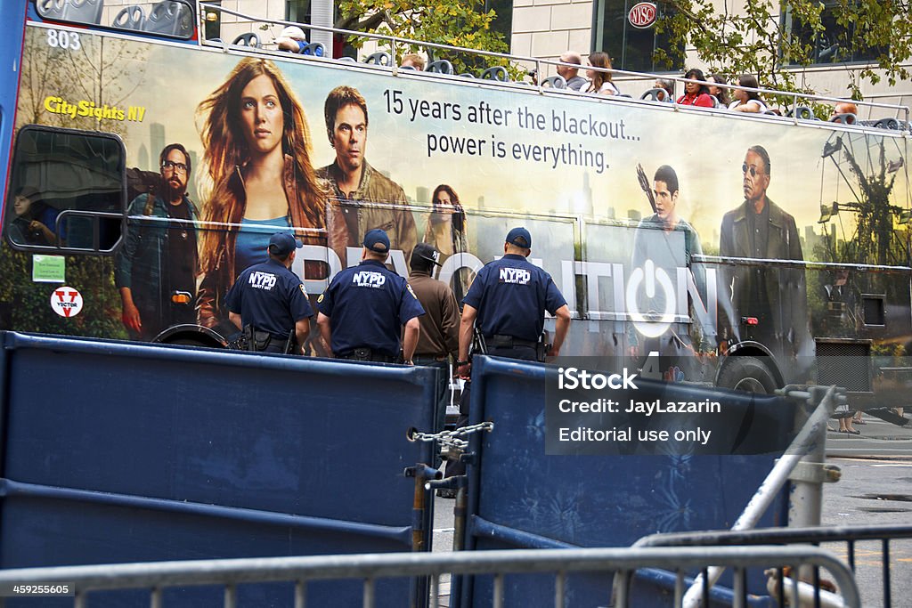 NYPD Officers at Counter Terror vehicle checkpoint, Lower Manhattan, NYC "New York City, USA - September 03, 2012: Three NYPD-New York Police Department officers are stationed at Vesey and Broadway at a counter terror security checkpoint in Lower Manhattan." Advertisement Stock Photo