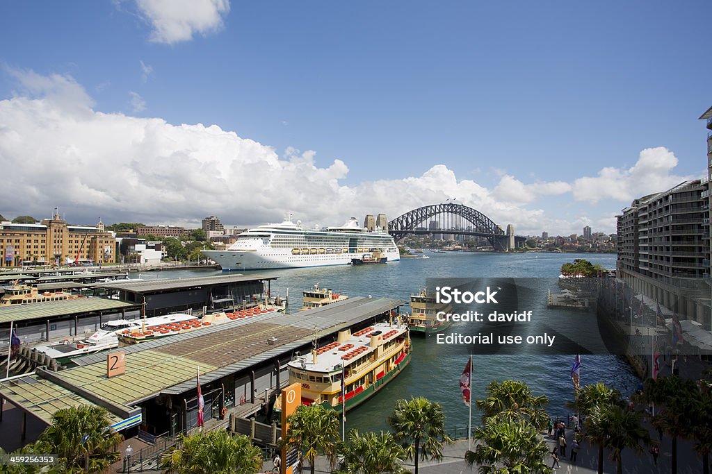 Circular Quay, and the Sydney Harbour Bridge "Sydney, NSW, Australia - December 12, 2012: Commuters and tourists flock to Circular Quay drawn by ferries, ocean liners and the view of the Sydney Harbour Bridge" Australia Stock Photo