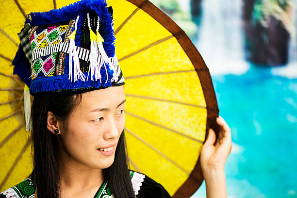 hmong 、パラソルを持つ若い女性 - parasol umbrella asian ethnicity asian culture ストックフォトと画像