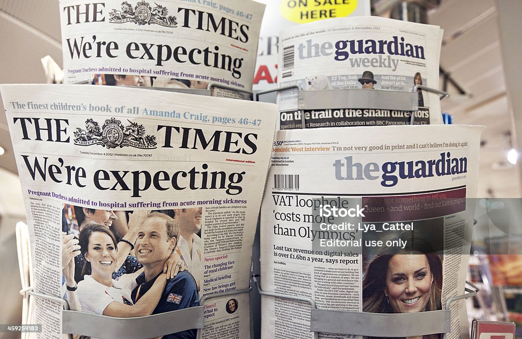 Kate and William expecting baby # 2 XXL "Amsterdam, the Netherlands - December 4, 2012: The English newspaper The Times in a newsstand with headlines on the front page of the news that the Duke and Duchess of Cambridge are expecting a baby. After a year-and-a-half of marriage, Prince William and Kate Middleton are expecting their first baby. The couple decided to go public with the news of the pregnancy after the duchess was admitted to the hospital with acute morning sickness." Prince William of Wales Stock Photo