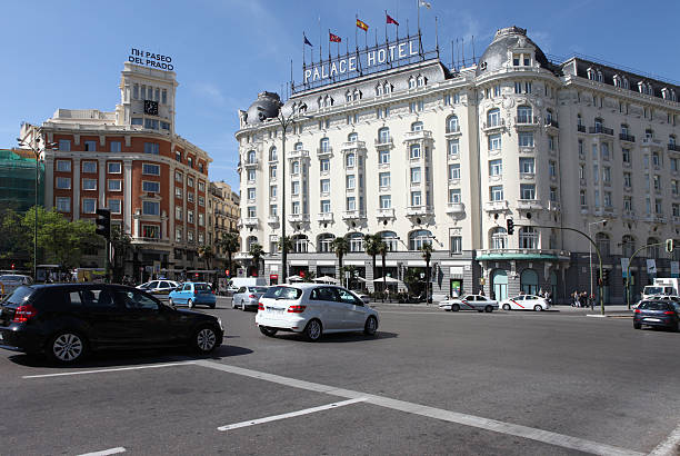 Traffic by Metropolis building in the center of Madrid, Spain stock photo
