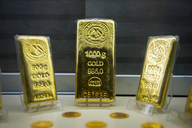 Istanbul, Turkey - January 10, 2013: Gold bars in a storefront window display at the Grand Bazaar in Istanbul. The bars are minted in Turkey.