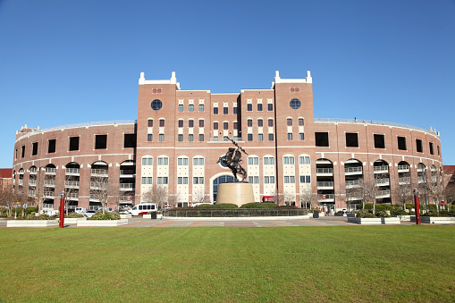 Tallahassee, Florida, USA - March 3, 2013: The Unconquered Student Statue at Doak Campbell Stadium that celebrates the human spirit that will not be defeated