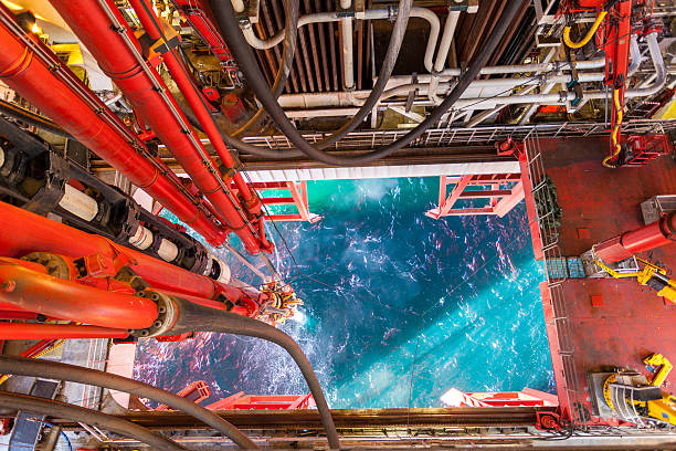 istock oil rig platform riser pipes to sea 459262599