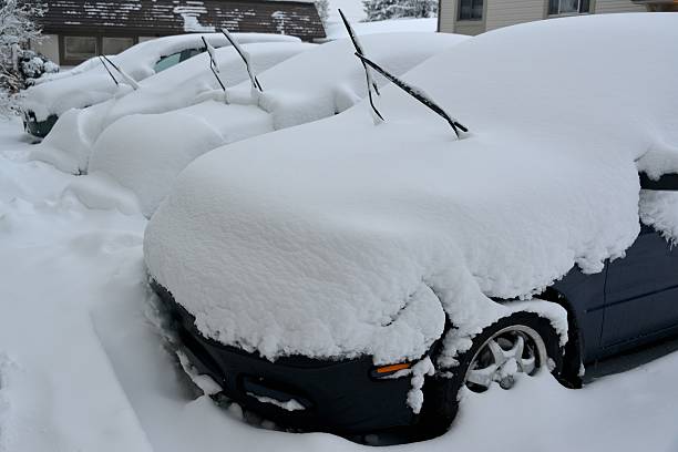 istock Snow covered cars 459263315
